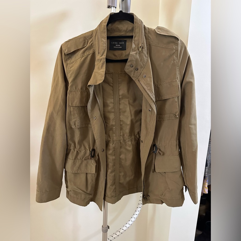 Green utility jacket.